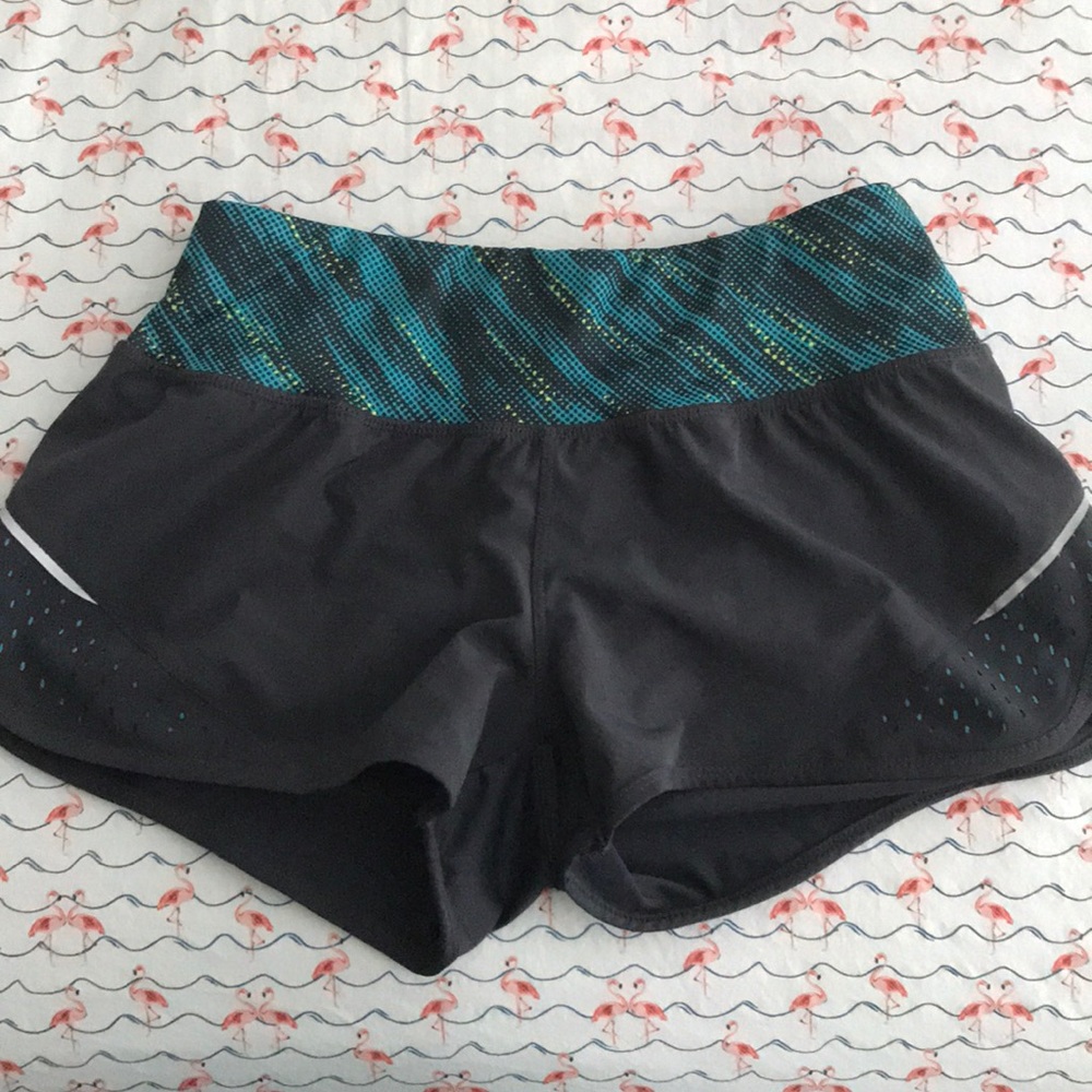Gray running shorts with liner and back pocket